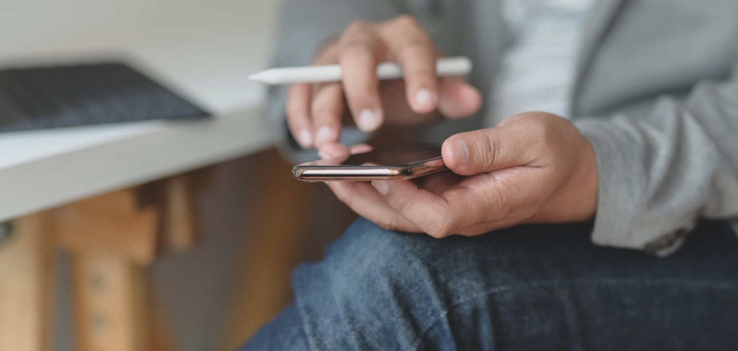 Person Holding Smartphone